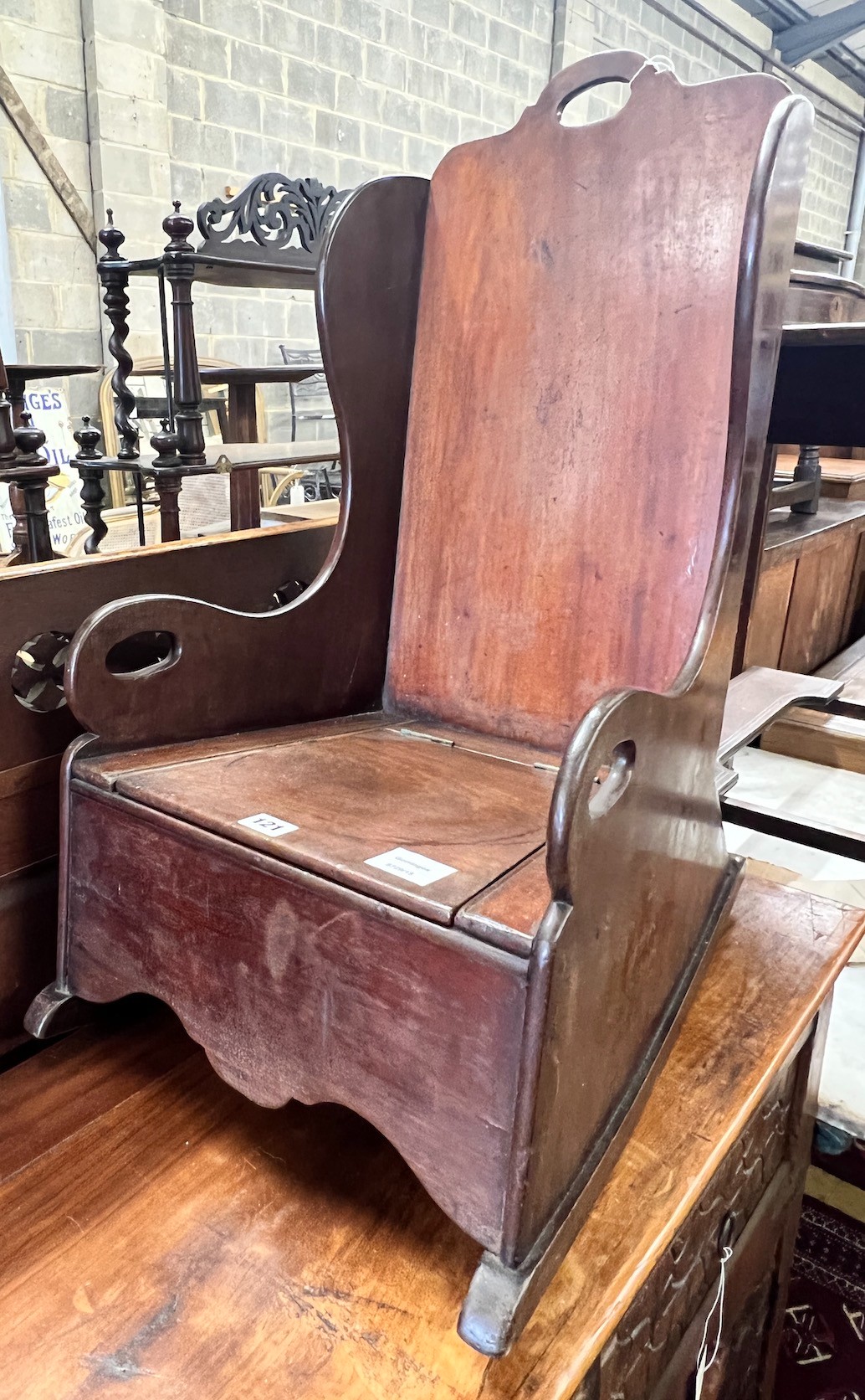 A child's Victorian mahogany wing back commode chair, width 37cm, depth 57cm, height 71cm